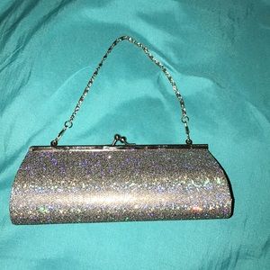 Small silver glittery clutch